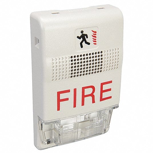 Edwards G1F-VM fire alarm sensor with ULC certification, mounted on a wall in a commercial building setting.