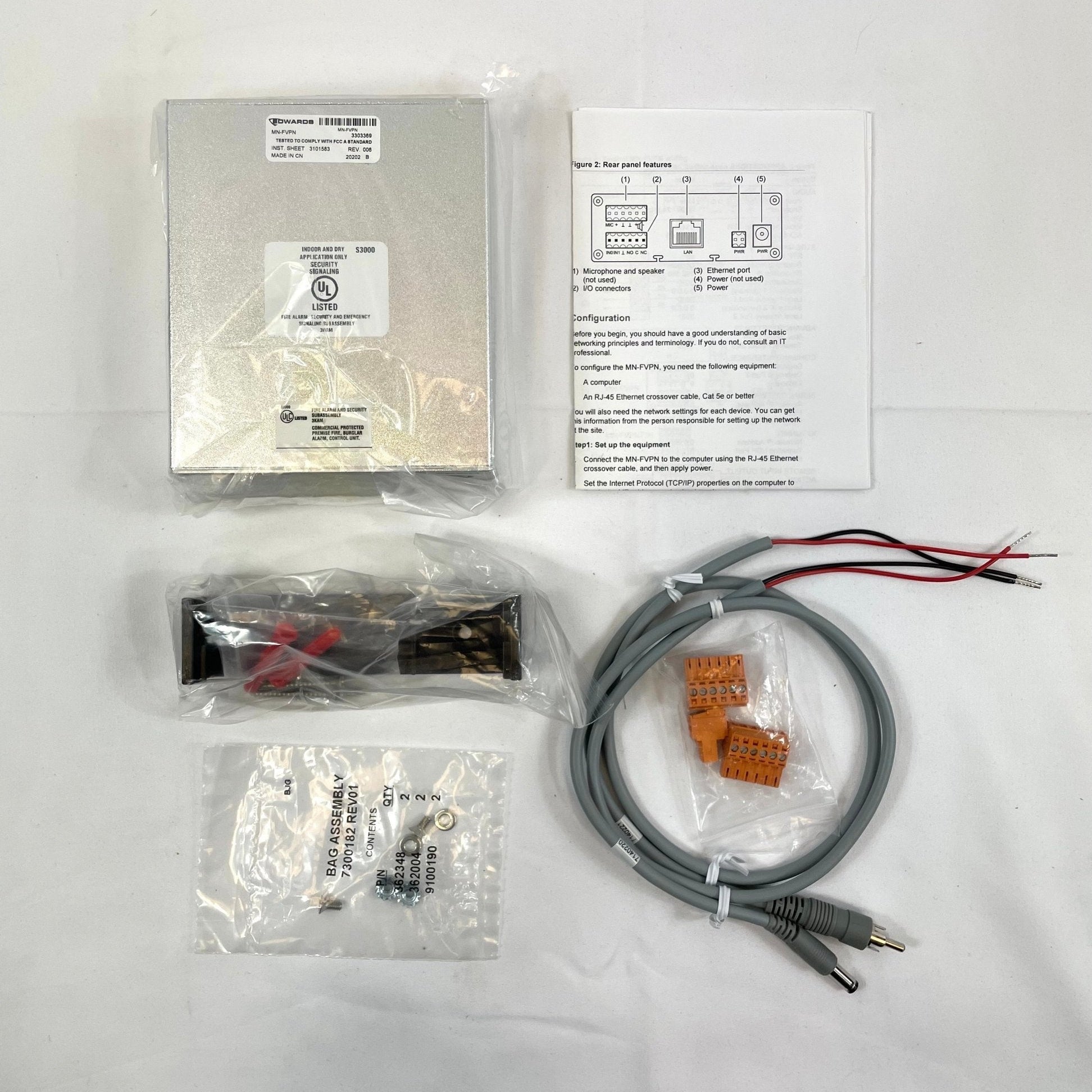 Edwards MN-FVPN fire alarm sensor system with ULC certification, mounted on a white ceiling, showing detection components and wiring.