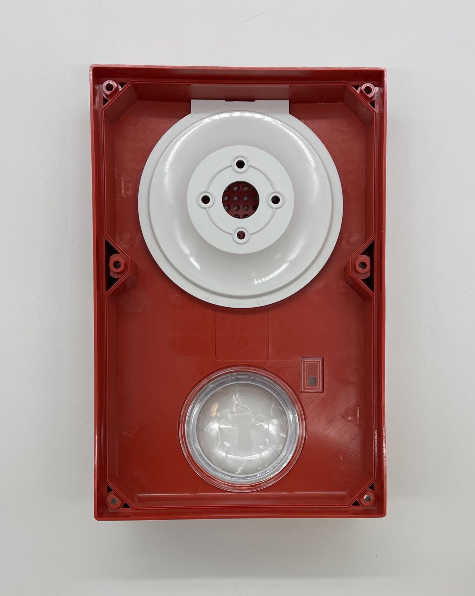 Edwards WG4RN-HVMHC horn strobe alarm with red housing and mounting bracket, designed for emergency notification systems.