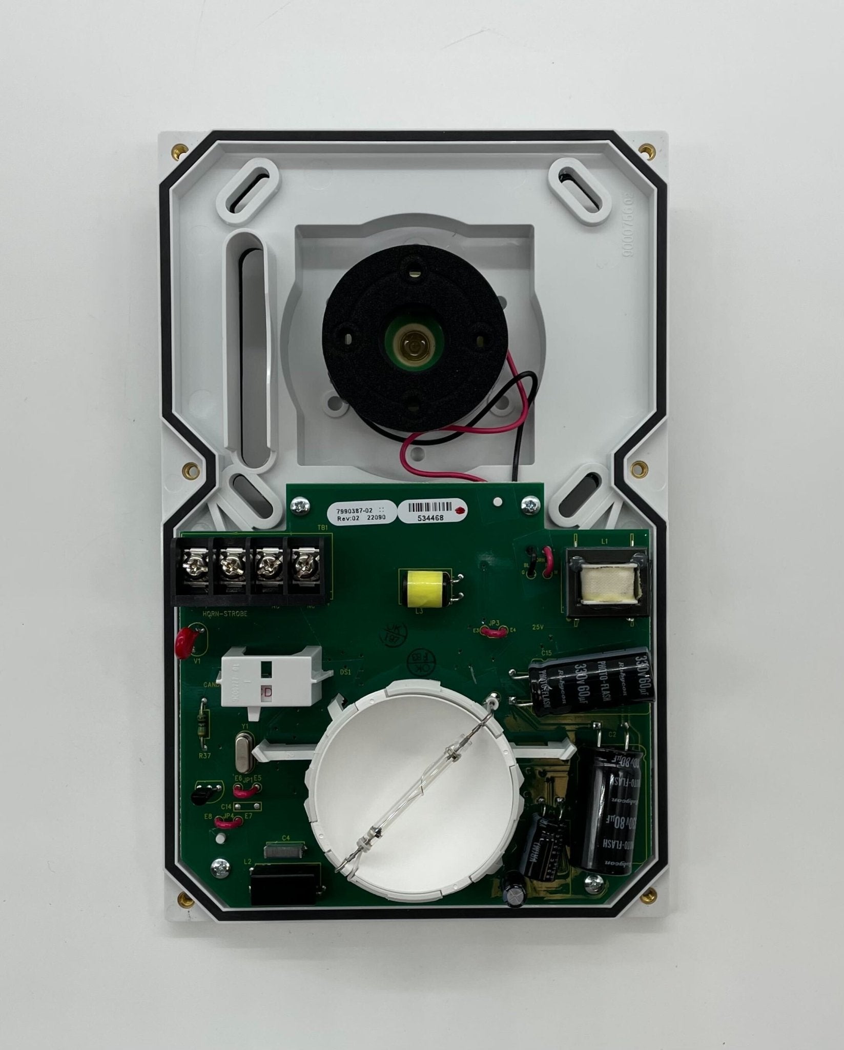 Edwards WG4RN-HVMHC horn strobe alarm device mounted on a ceiling, designed for emergency alert systems.