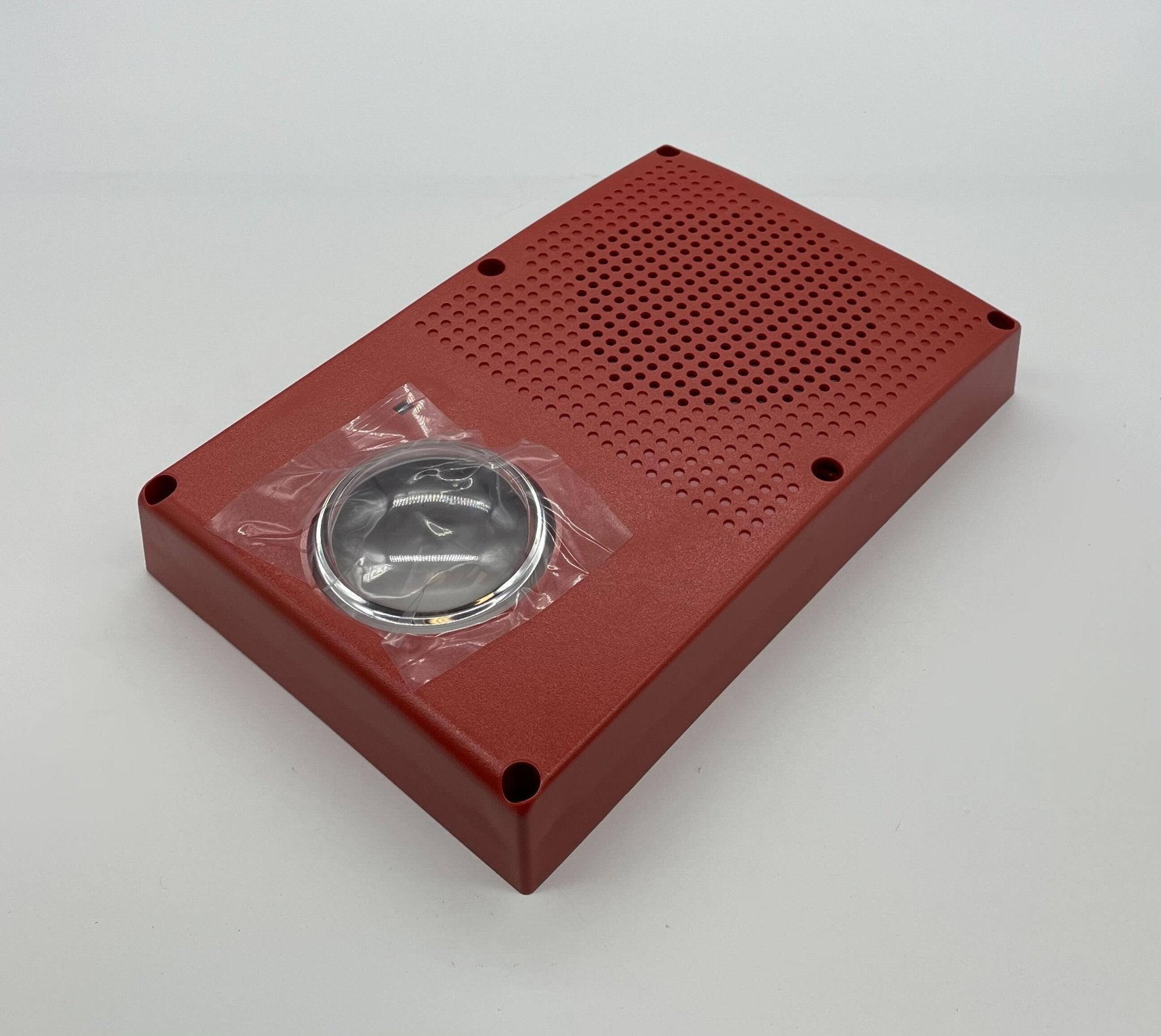 Edwards WG4RN-HVMHC horn strobe alarm with red horn and clear strobe light, mounted on a white wall for emergency alert.