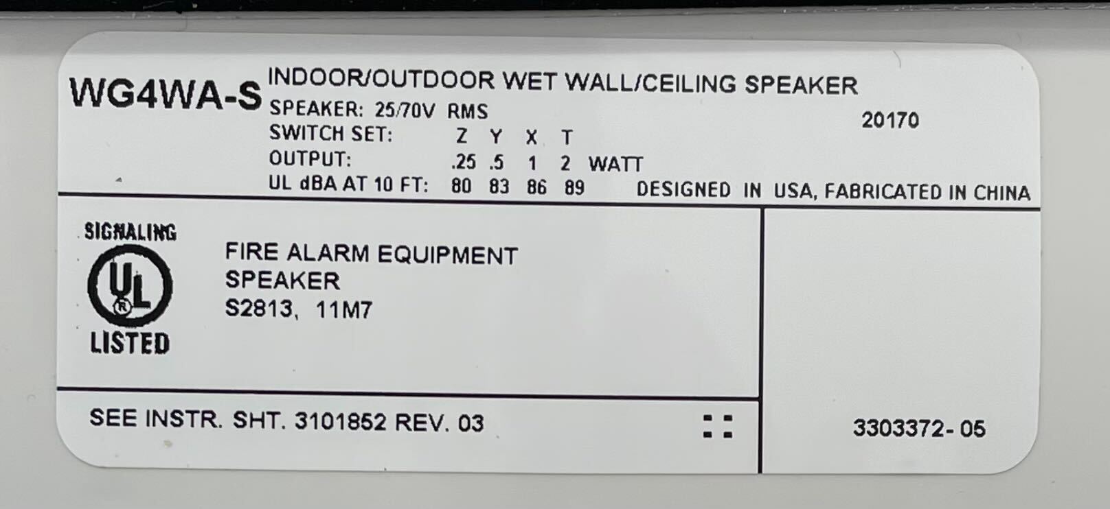 Edwards WG4WA-S speakers with black enclosures, mounted on a wall in a professional audio setup.