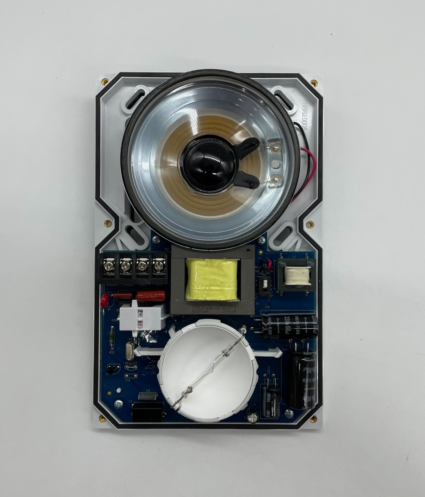 Edwards WG4WF-SVMHC speaker strobe light mounted on a ceiling, white warning device for emergency alert systems.