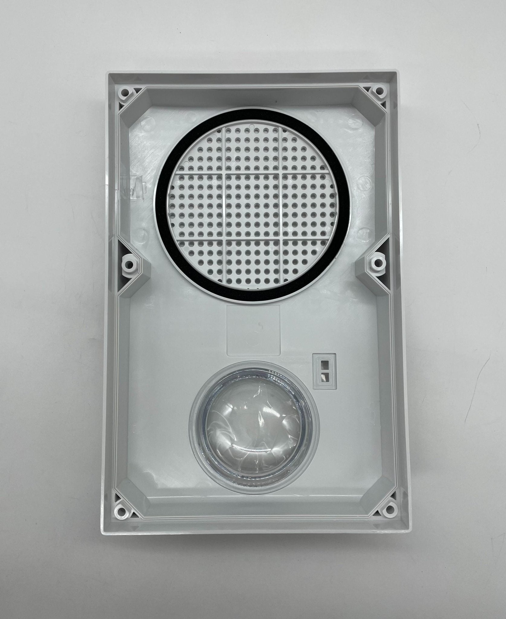 Edwards WG4WF-SVMHC speaker strobe light with white housing and visible wiring for emergency notification systems.