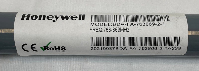 Fiplex by Honeywell BDA-FA-763869-2-1 communication device mounted on a wall with wiring visible