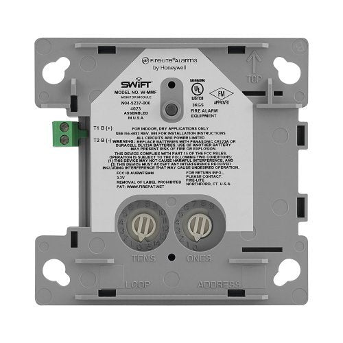 Fire-Lite W-MMF fire alarm module installed on a wall, part of the Fire-Lite fire alarm system for commercial safety.