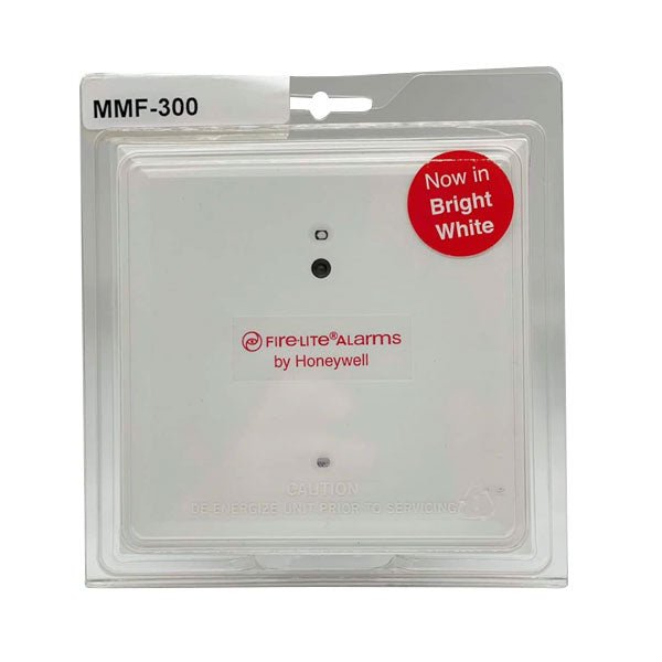 Firelite MMF-300 fire alarm control module mounted on a panel with wiring and indicators, used in fire alarm systems.