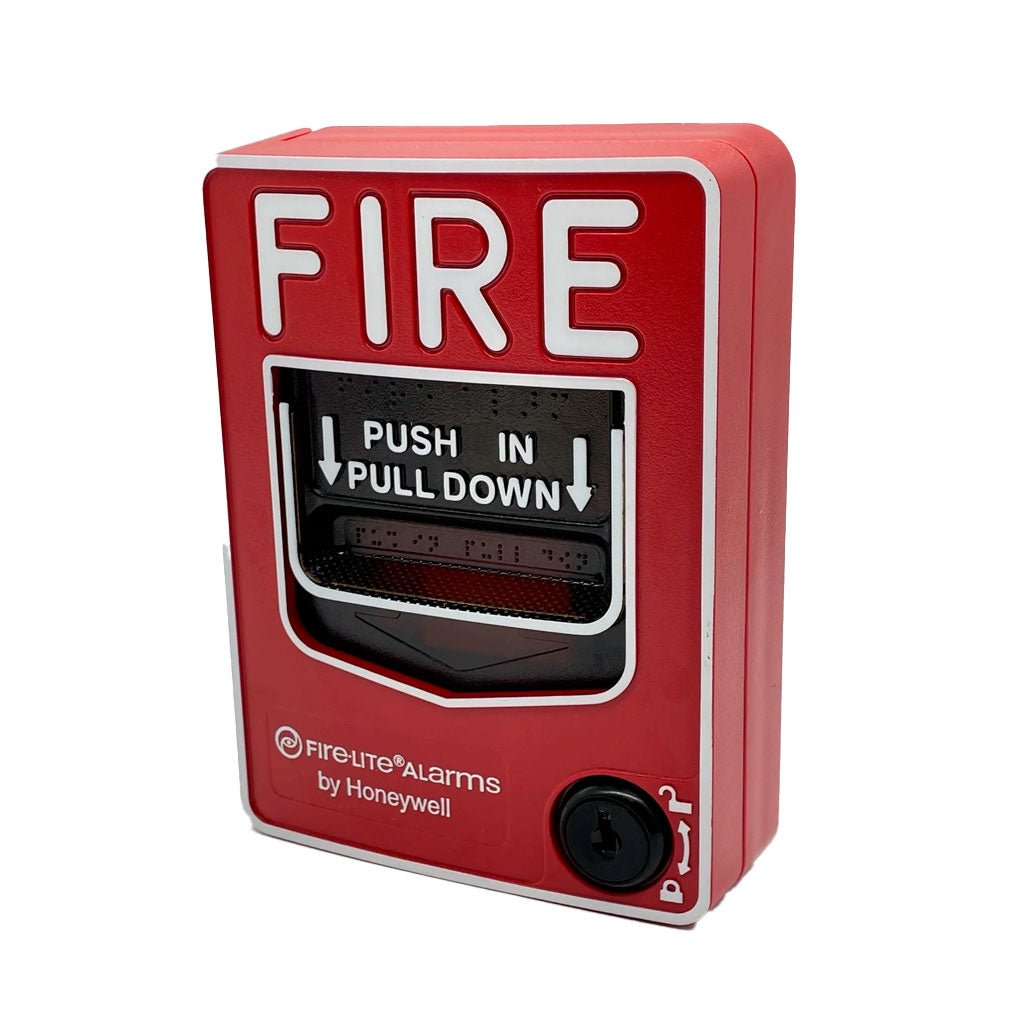 Firelite BG-12LAO fire alarm control panel with Jem Systems Canada branding, mounted on a wall with visible wiring and indicators.
