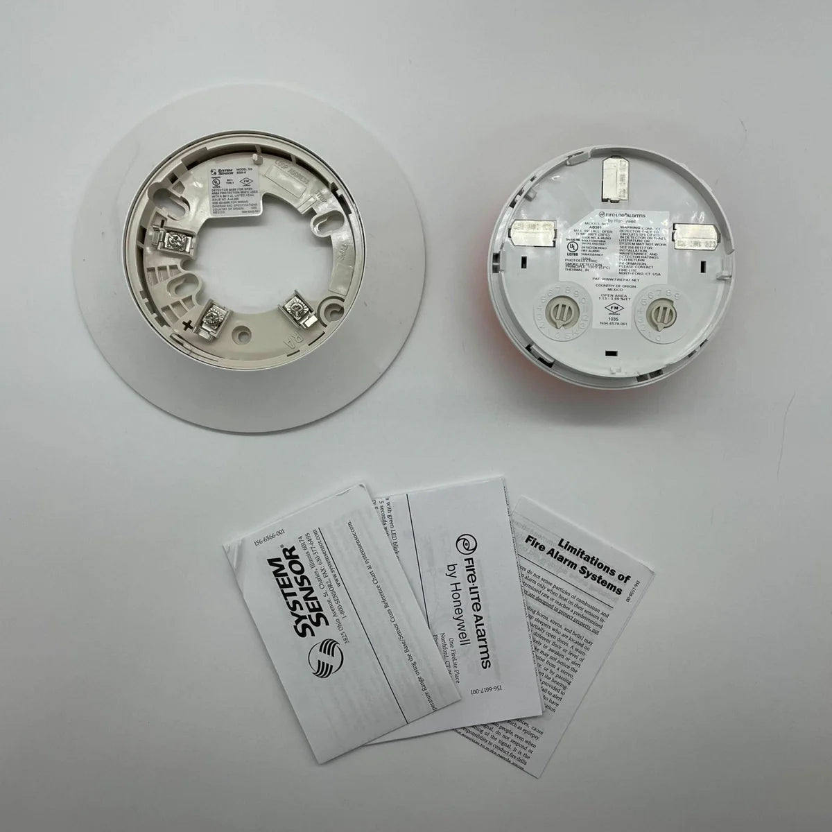 FireLite AD365 fire alarm control panel with LED display and control buttons, designed for fire detection and emergency management.