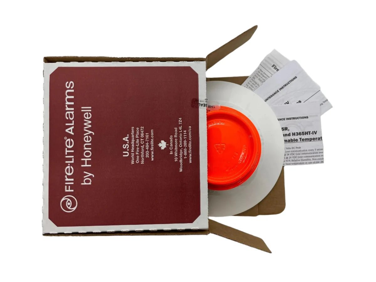 Fire-Lite Firelite H365 fire alarm control panel with display and control buttons, mounted on a wall.