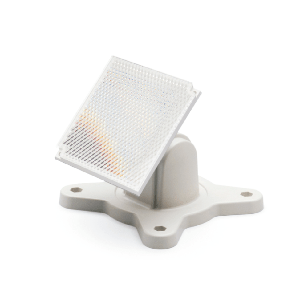 Simplex 5000-008 fire alarm device, white with test and reset buttons, mounted on a wall for fire safety.