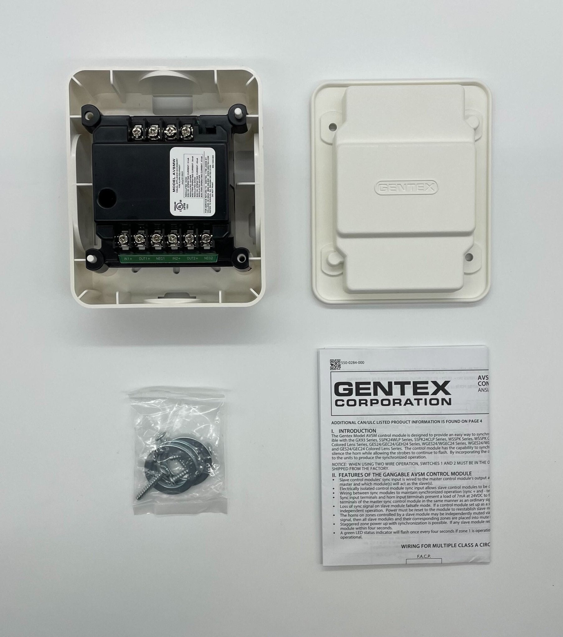 Gentex AVSM-W synchronization control module in white, showing its compact design and connection ports.