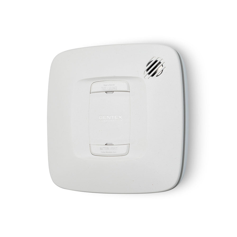Gentex CR (918-0036-002) carbon monoxide alarm with relay and digital display, mounted on wall in a residential setting.