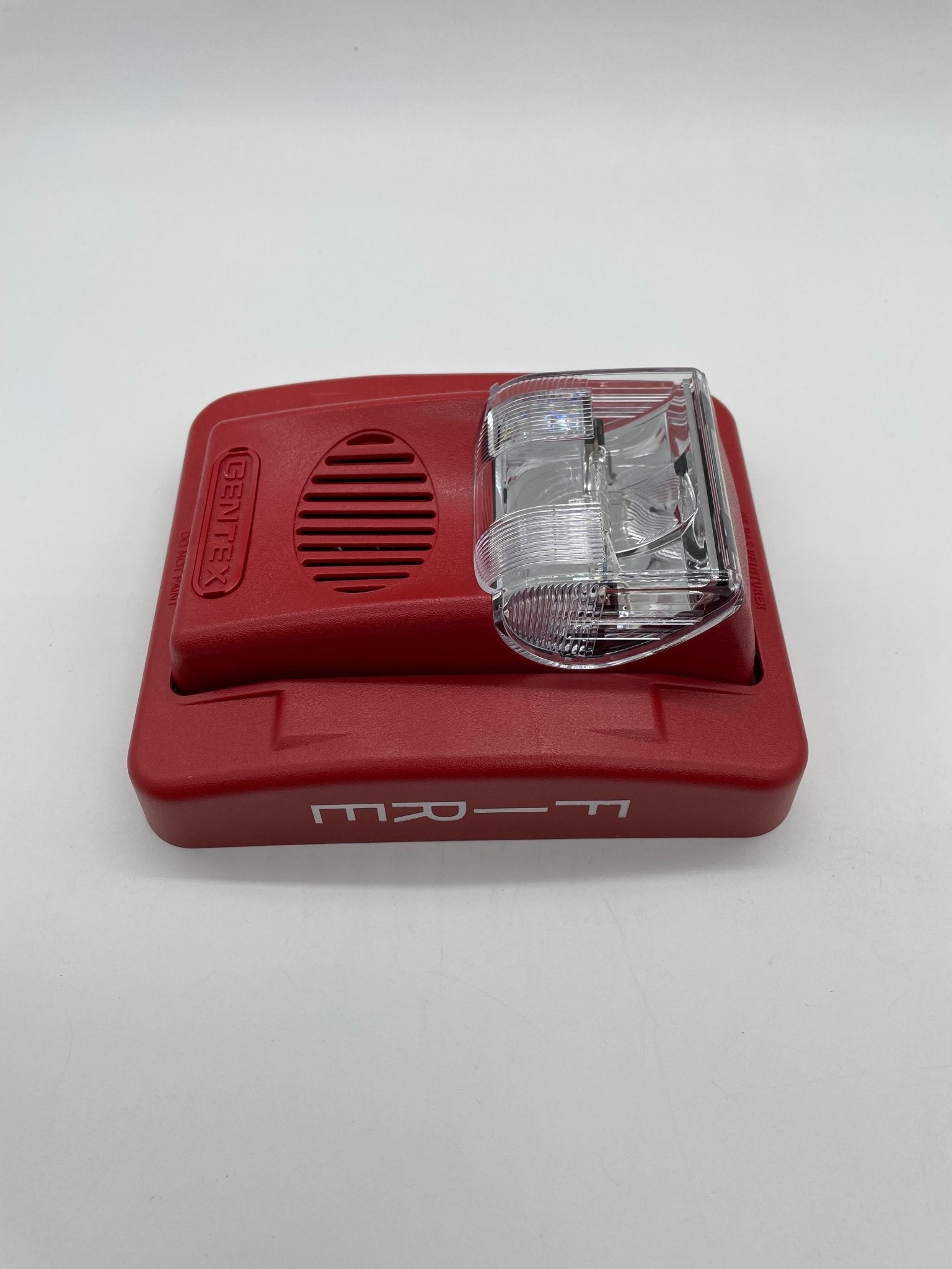 Gentex GEC24-177WR horn strobe alarm with red casing and mounting hardware, designed for fire safety and emergency signaling.