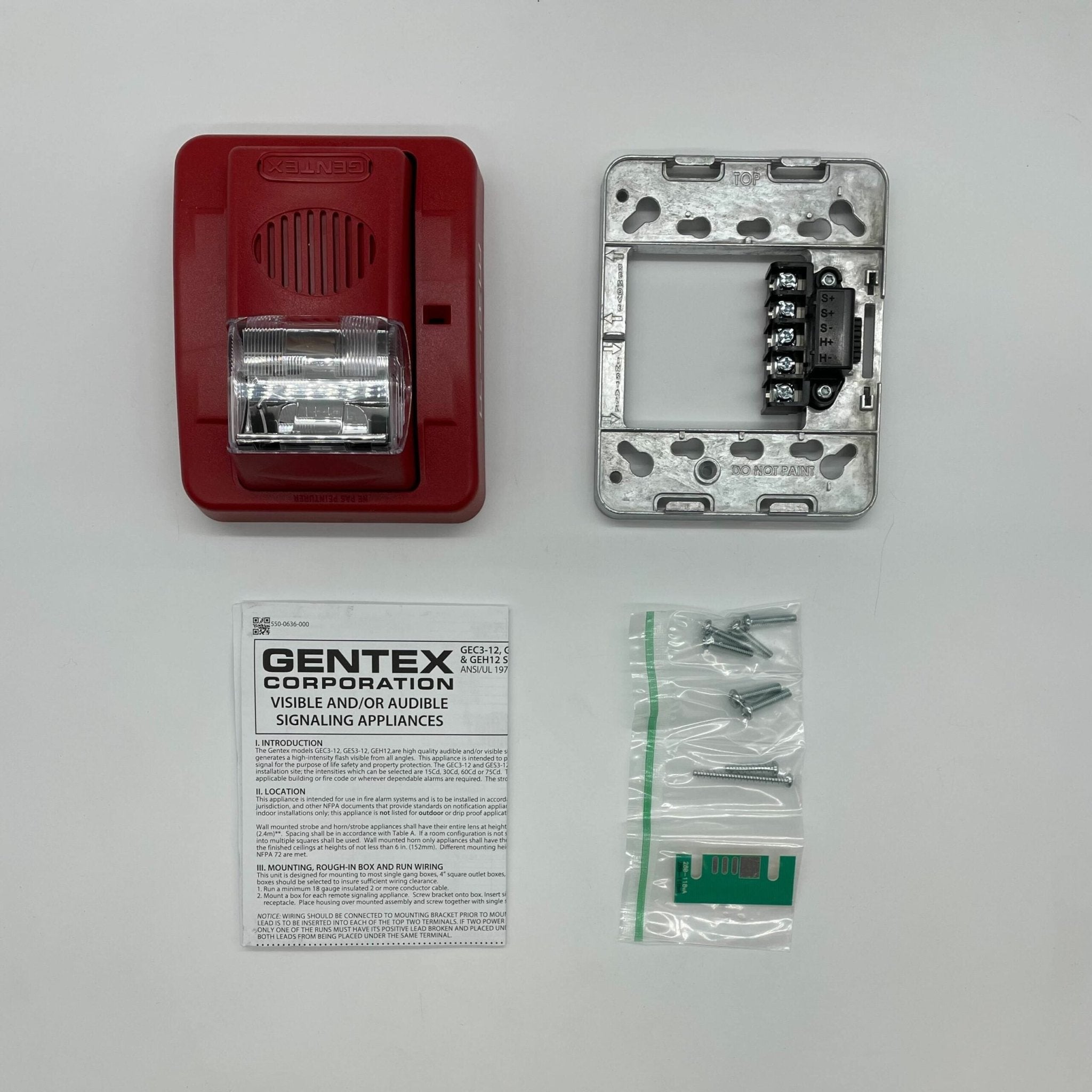 Gentex GEC3-12WR horn strobe alarm with red housing and clear lens, mounted on wall for fire safety signaling.