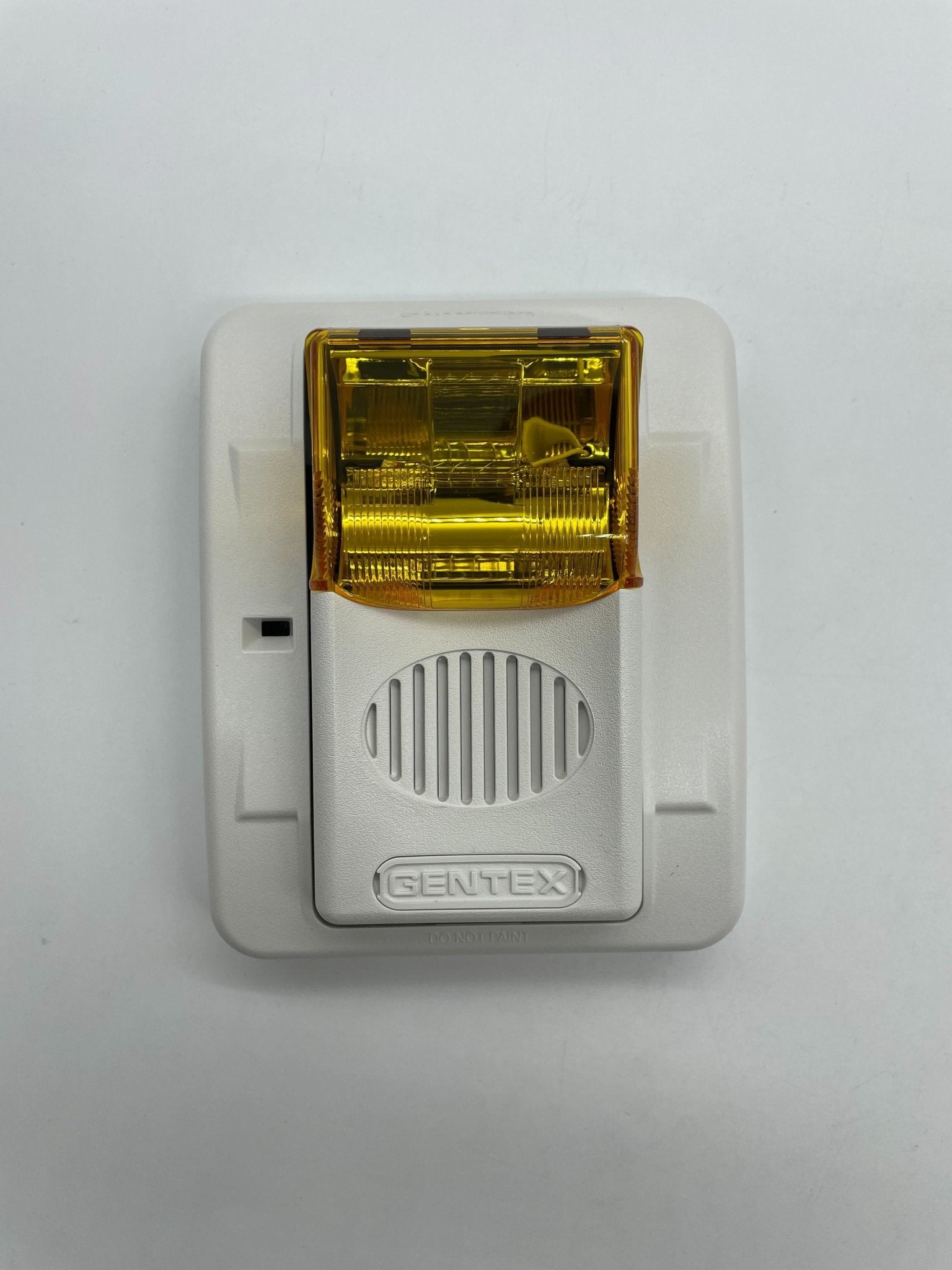 Gentex GECA24PWW horn strobe alarm with white housing, designed for fire safety and emergency alert systems.