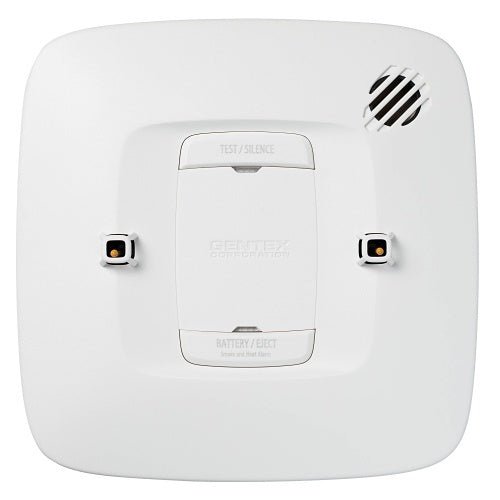 Gentex H220 heat alarm, 220VAC heat detector mounted on ceiling, designed for fire safety in residential or commercial buildings.