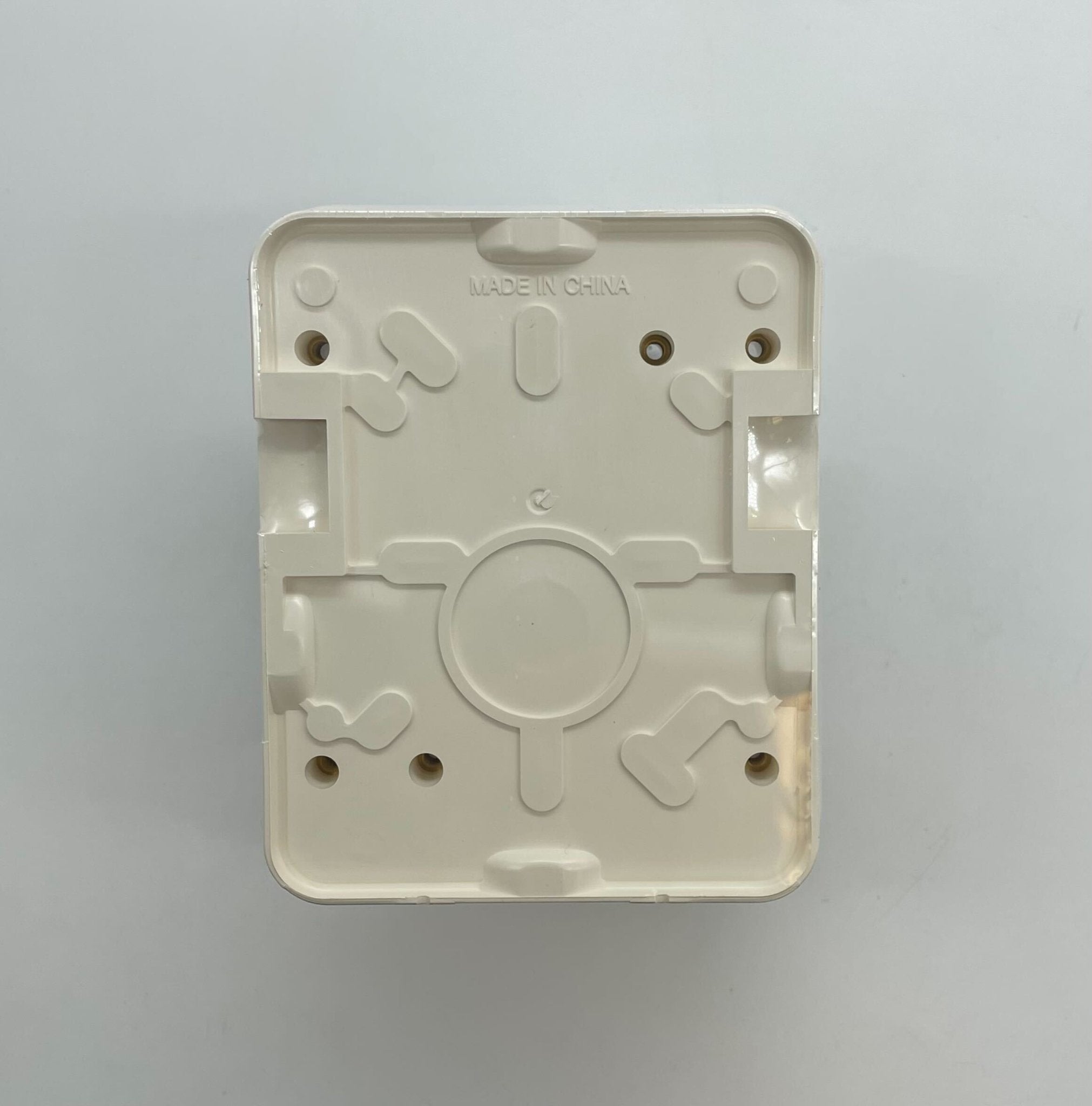Gentex WGECB24-75PWW horn strobe alarm device with white housing, mounted on wall, for fire and security alert systems