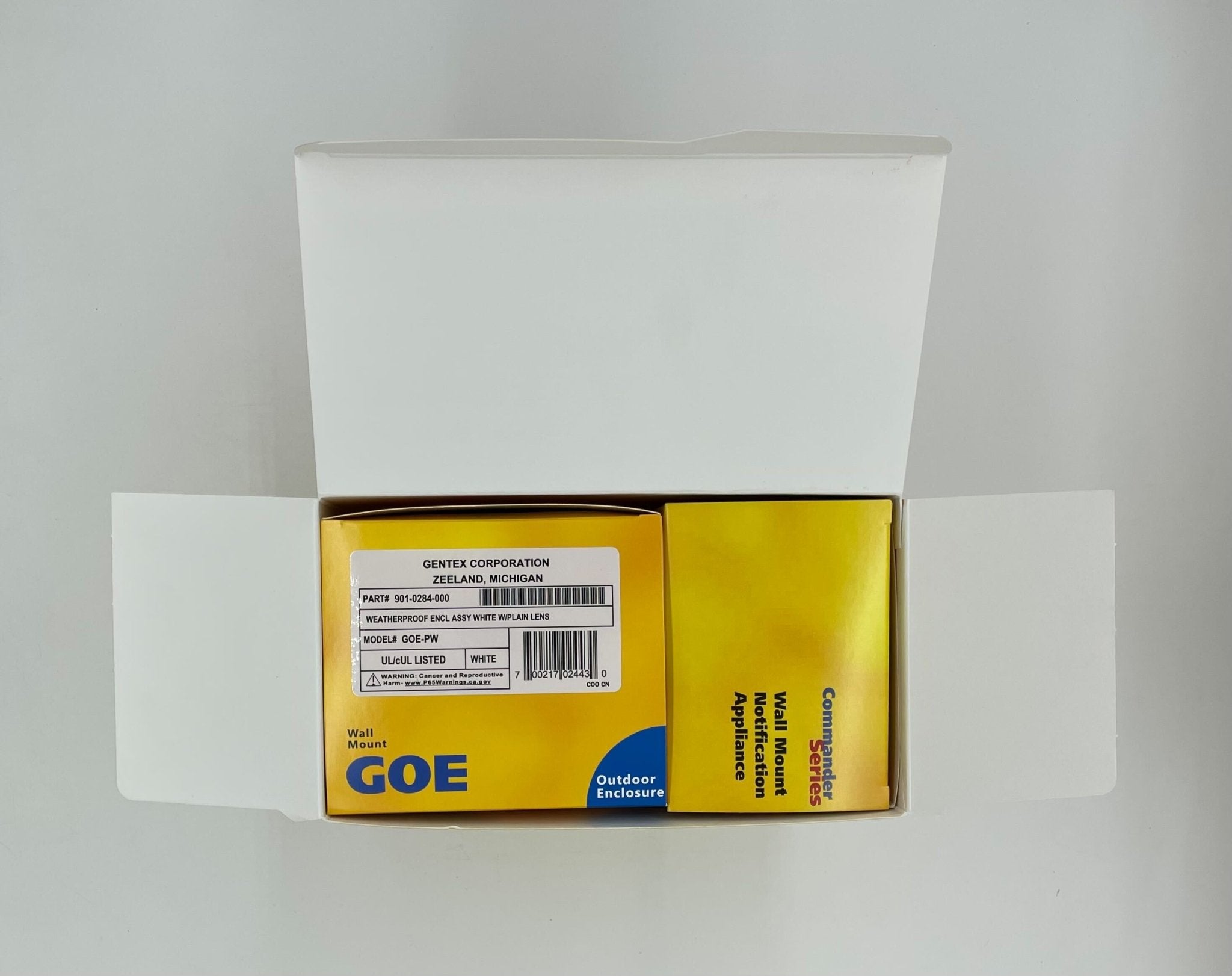 Gentex WGECB24-75PWW horn strobe alarm with yellow casing and mounting bracket, designed for fire and safety alerts