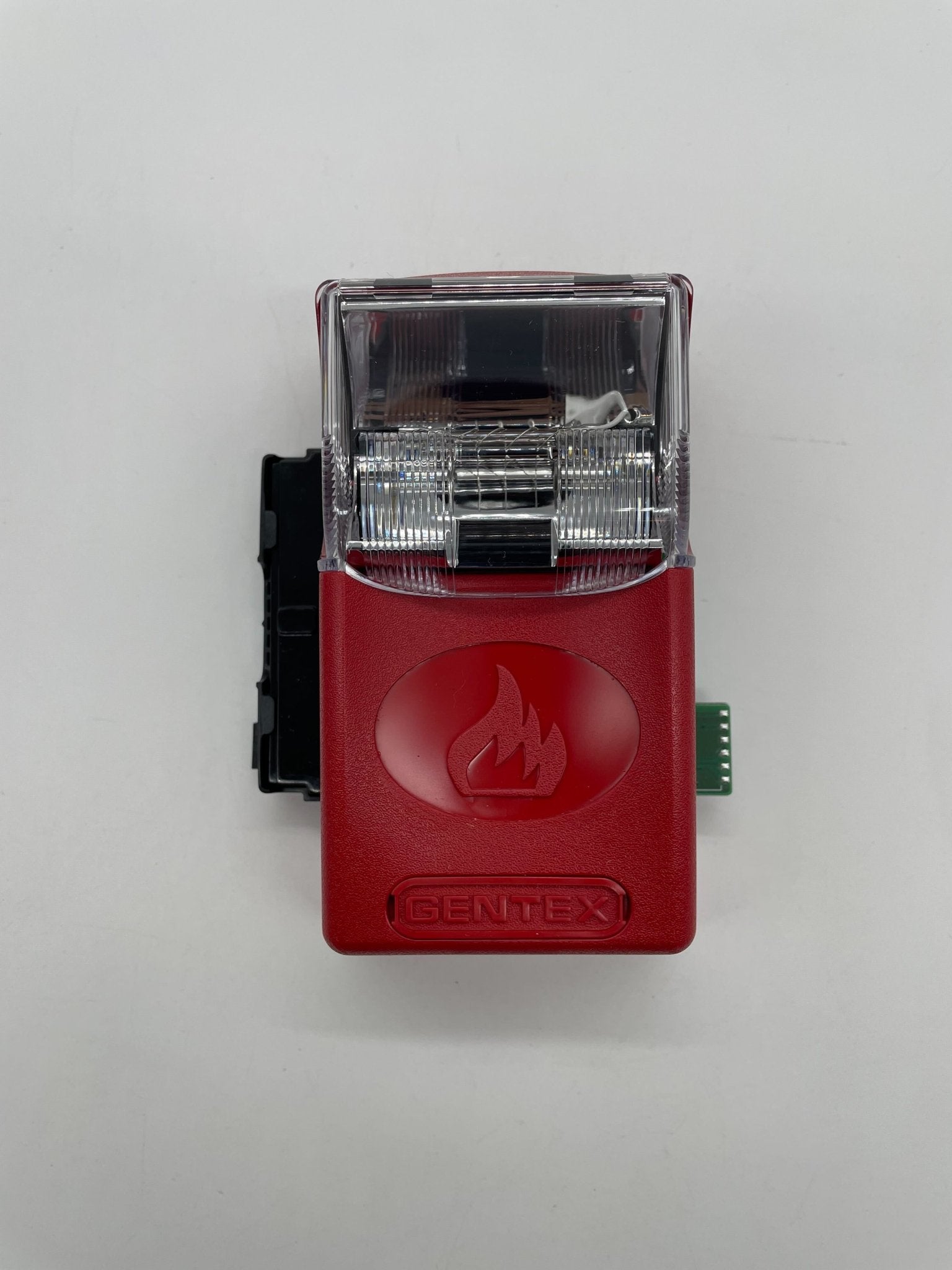 Gentex WGES24-75WR strobe light with red and white lenses, mounted on a ceiling for emergency warning signals.