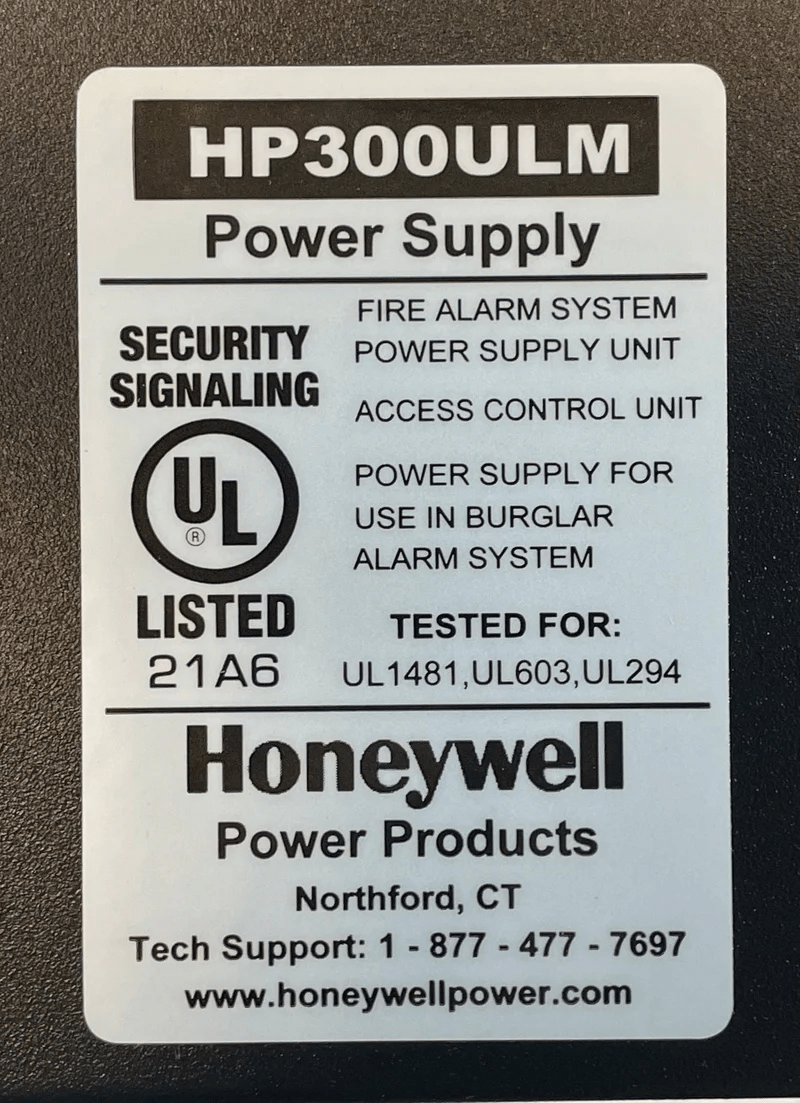 Honeywell HP300ULM smoke and carbon monoxide detector with digital display, mounted on wall in a home setting