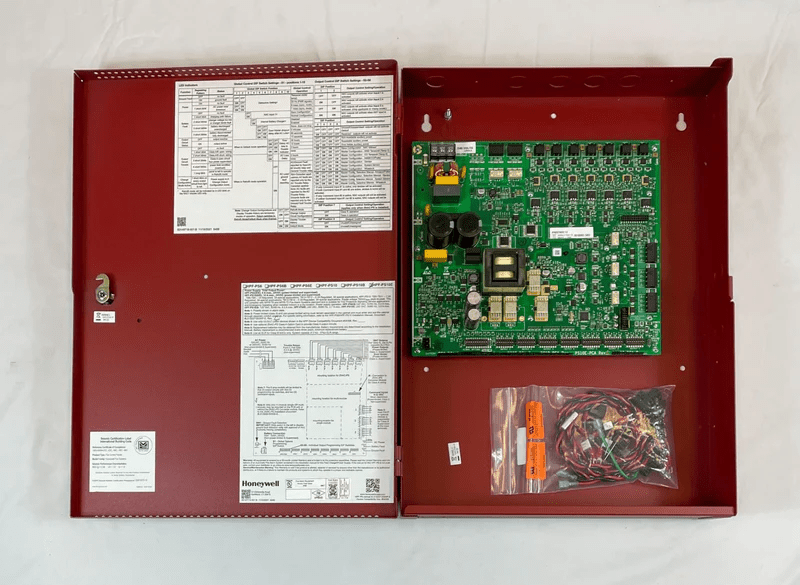 Honeywell HPF-PS10E fire and smoke detector with alarm and mounting bracket, designed for safety and early warning.