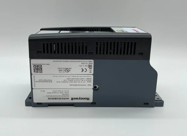 Honeywell HVFD2D3B0020 variable frequency drive mounted on industrial equipment, with digital control panel and wiring connections.