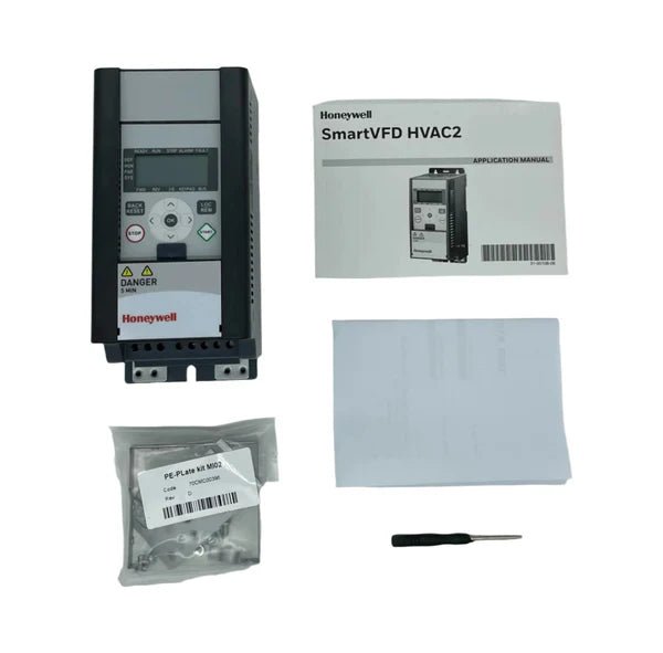 Honeywell HVFD2D3B0020 variable frequency drive installed in an industrial setting with control panel and wiring.