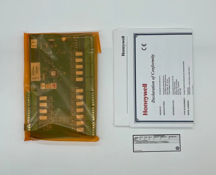 Honeywell PW6K1OUT outdoor air quality sensor mounted on a wall, with digital display and wiring connections visible.