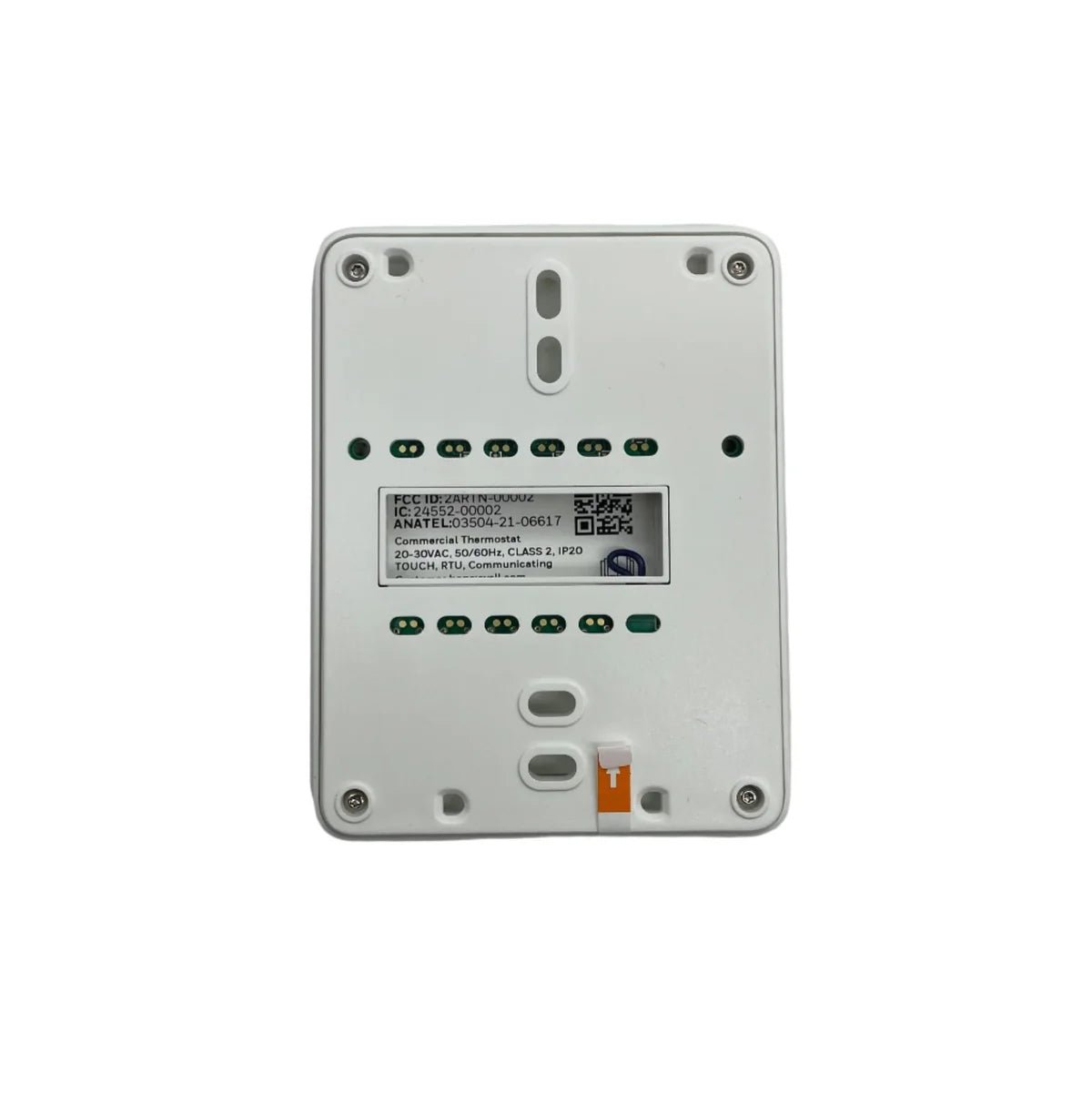 Honeywell TC500A-N thermostat with digital display and control buttons, mounted on a wall for home climate regulation