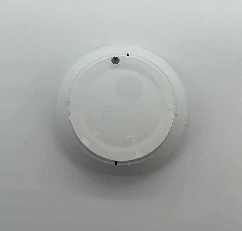 Honeywell TC840C3206 smart thermostat mounted on wall, digital display showing temperature and settings.