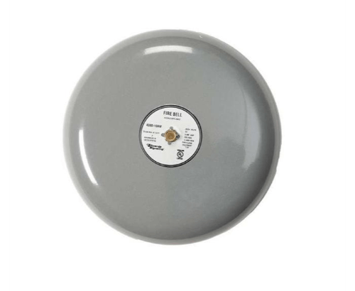 Edwards 439D-10AW fire alarm with white plastic casing and test button, mounted on a wall for fire safety detection.