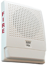 Edwards G4LFWF-H fire alarm detector mounted on ceiling, part of Edwards fire alarm system for safety and fire detection.