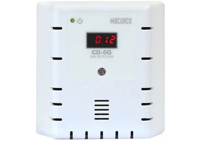 Macurco CD-6G gas detector sensor with digital display, mounted on wall for indoor air quality monitoring.