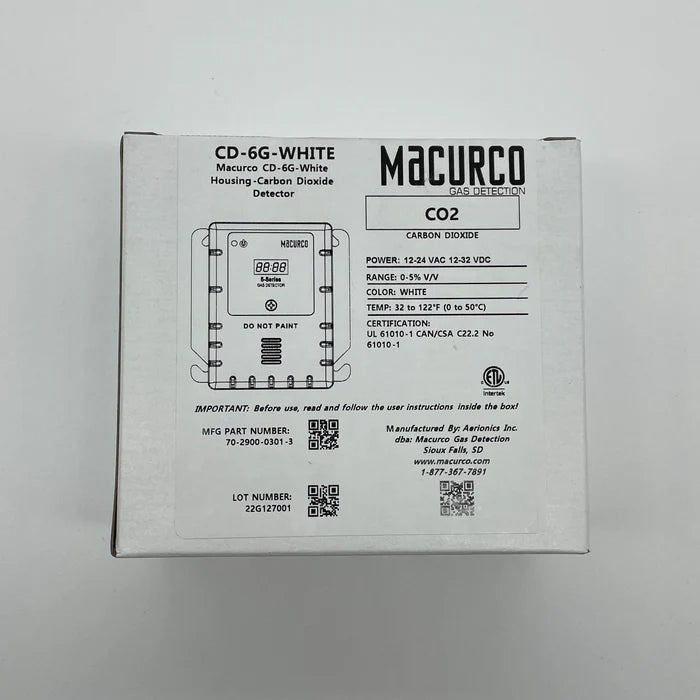 Macurco CD-6G gas detector sensor with digital display for indoor air quality monitoring, mounted on a wall.