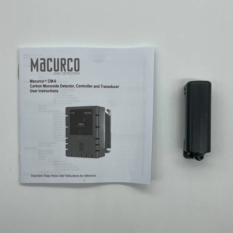 Macurco CM-CH carbon monoxide detector with digital display, mounted on wall for home safety monitoring