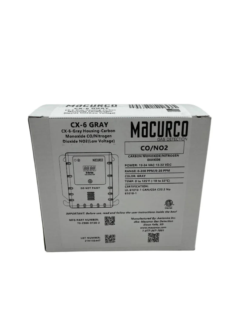 Macurco CX-6 gas detector installed on a wall, designed for indoor air quality monitoring and safety detection.