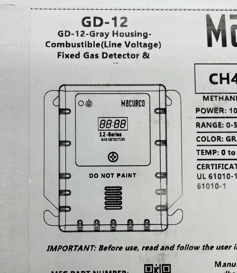 Macurco GD-12 gas detector mounted on wall, used for indoor air quality monitoring and gas detection.