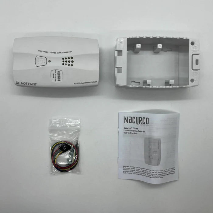 Macurco GD-2B gas detector with digital display and sensor, used for monitoring indoor air quality and gas leaks.