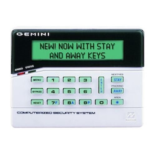 Napco GEM-K1CA security alarm system control panel with keypad and wiring for home security setup.