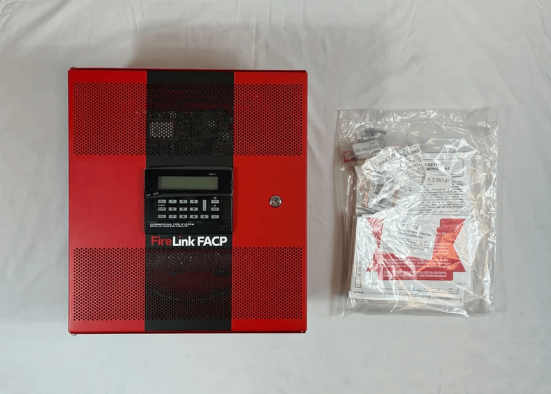 Napco FL-32FACP-LTEVS security alarm panel with keypad, mounted on wall, for home or business security system.