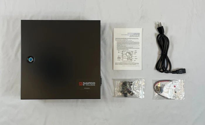 Napco NAE-2DM alarm system with keypad and sensors, installed in a modern home security setup.