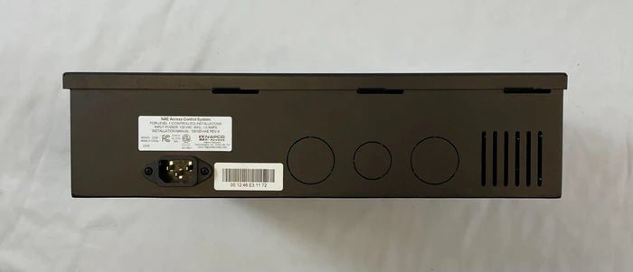 Napco NAE-2DM alarm control panel with digital keypad, mounted on wall, for home security system.