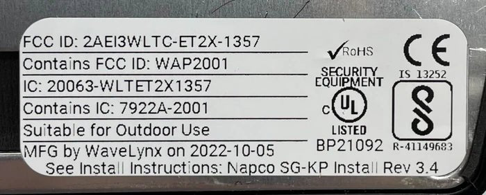 Napco NAE-ET20 Jem Systems security alarm control panel mounted on wall with visible buttons and display screen