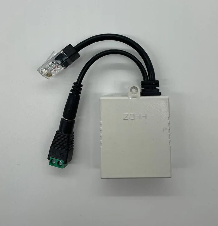 Napco NAE-POE-1D network alarm communicator with Ethernet port, shown in a professional installation setting.