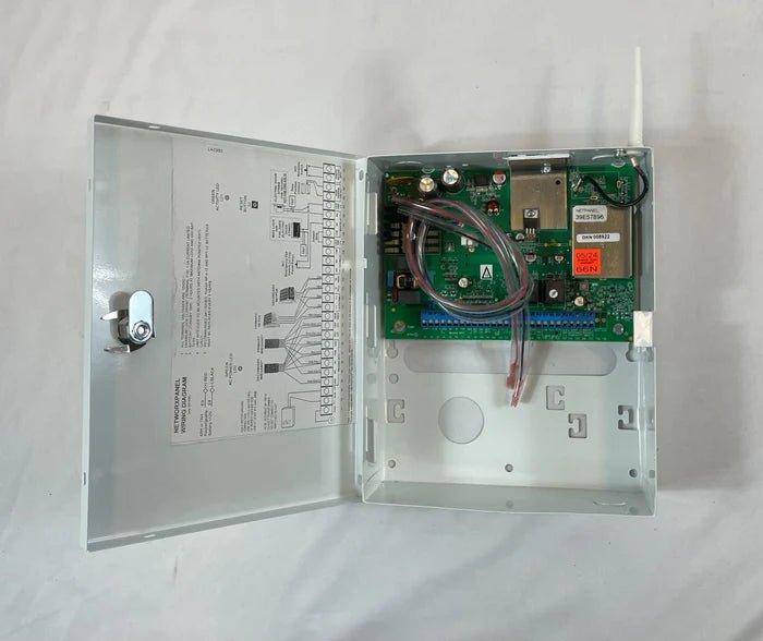 Napco NETWORXPANEL security system control panel with multiple connections and interface ports, installed on a wall.
