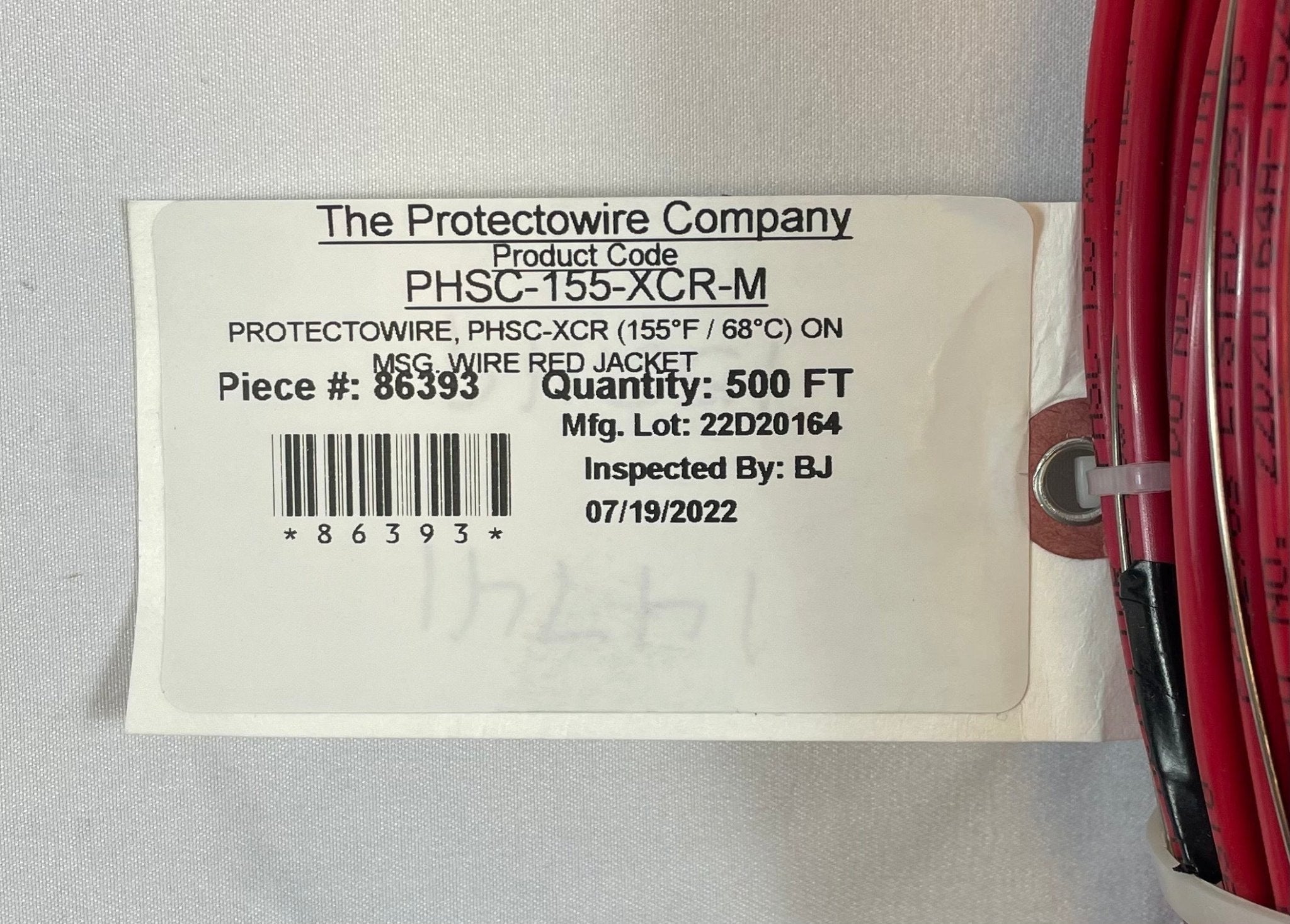 Protectowire PHSC-155-XCR-M linear heat detection cable installed in a commercial setting, designed for fire safety monitoring.