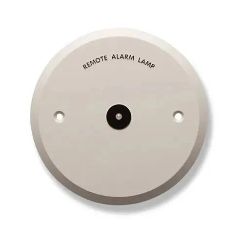 Siemens ILED-XC fire alarm with LED indicator and sleek design, mounted on wall for safety monitoring.