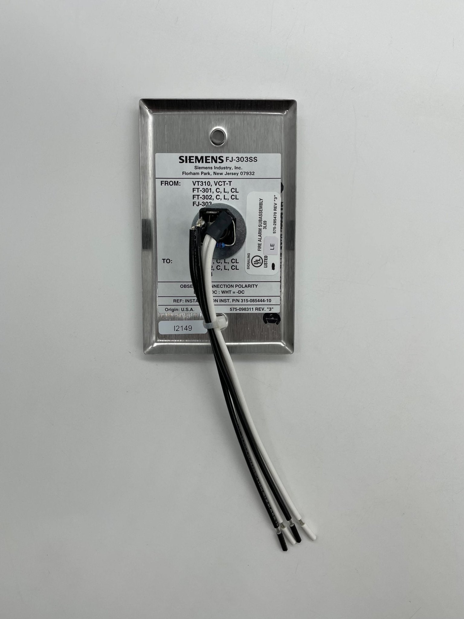 Siemens FJ-303SS fire alarm with stainless steel finish, mounted on a wall, for home or commercial safety.