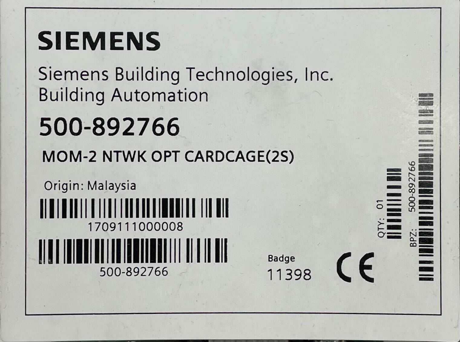 Siemens MOM-2 fire alarm device, compact safety alarm system with sensors, designed for fire detection and emergency alert.